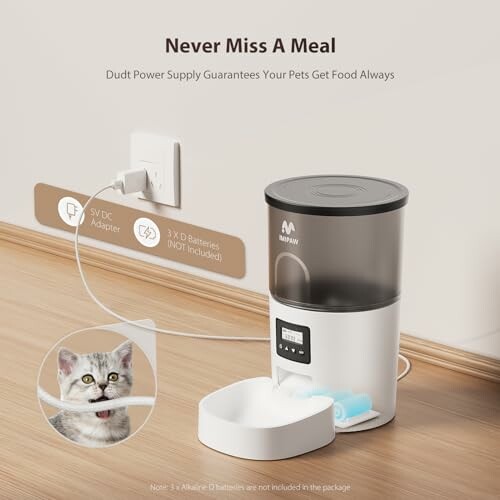 Automatic pet feeder with dual power supply options, featuring a kitten eating from a bowl.