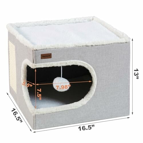 Gray cube cat bed with dimensions and plush ball inside.