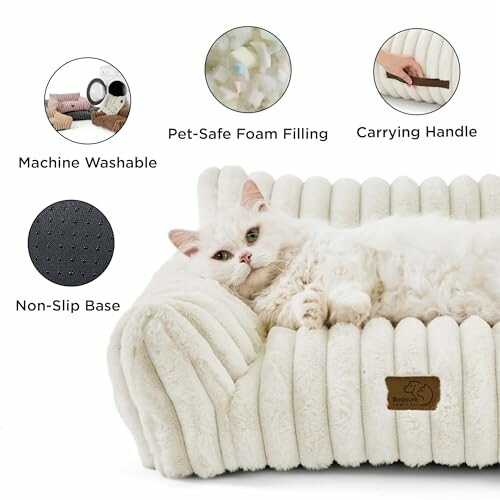 White cat lounging on a plush pet bed with features highlighted: machine washable, pet-safe foam filling, carrying handle, non-slip base.