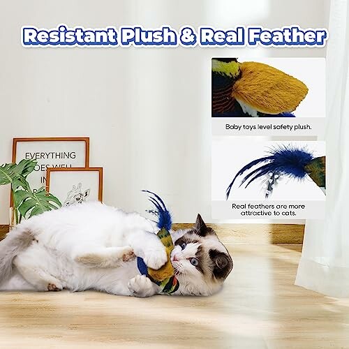 Cat playing with a resistant plush and real feather toy on the floor.