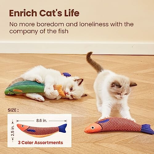 Two kittens playing with colorful fish toys on a wooden floor.