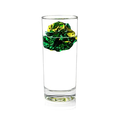 Glass of water with green and yellow foil