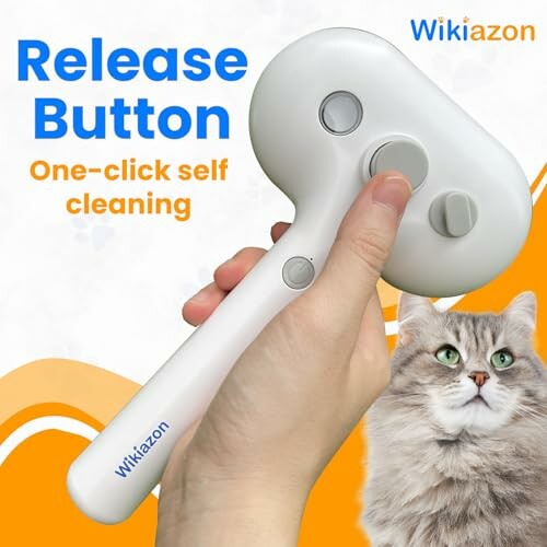 Hand holding a pet brush with a cat, featuring a release button for self-cleaning.