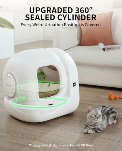 Cat sitting near an upgraded 360-degree sealed litter cylinder.